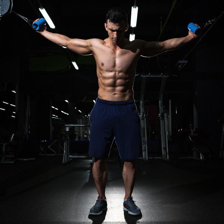 Women in a fitness class doing stretching and mobility exercises
